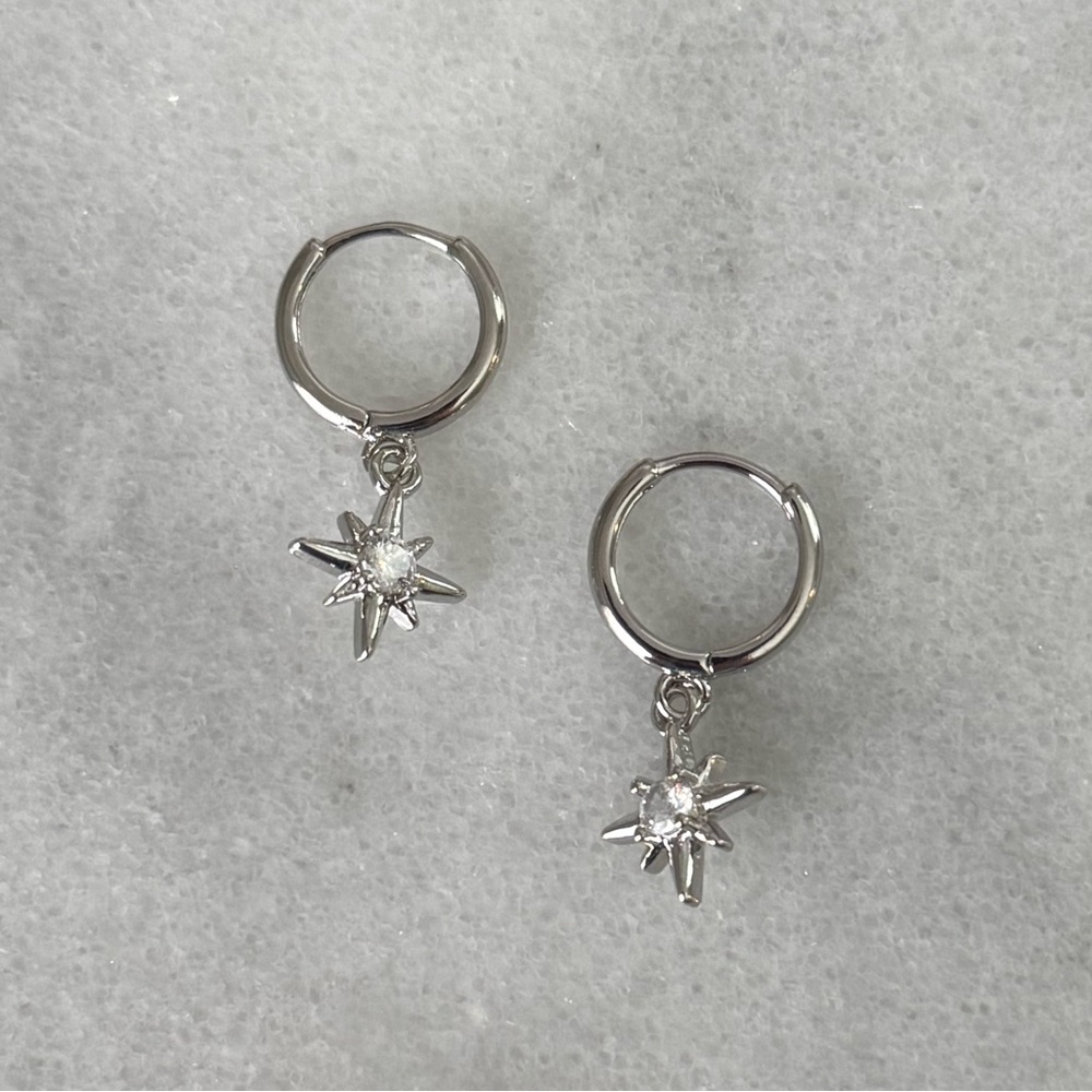 Silver Crystal Star Burst Dangle Hoop Earrings 

Brand New